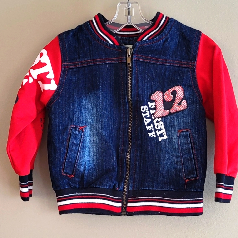 Denim zip up jacket with red sleeves